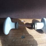 White porcelain door knob handles