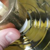 Lamp with outer shade of green glass and inner shade of clear double corrugated crystal glass