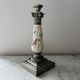 Silver-plated metal and porcelain candlestick