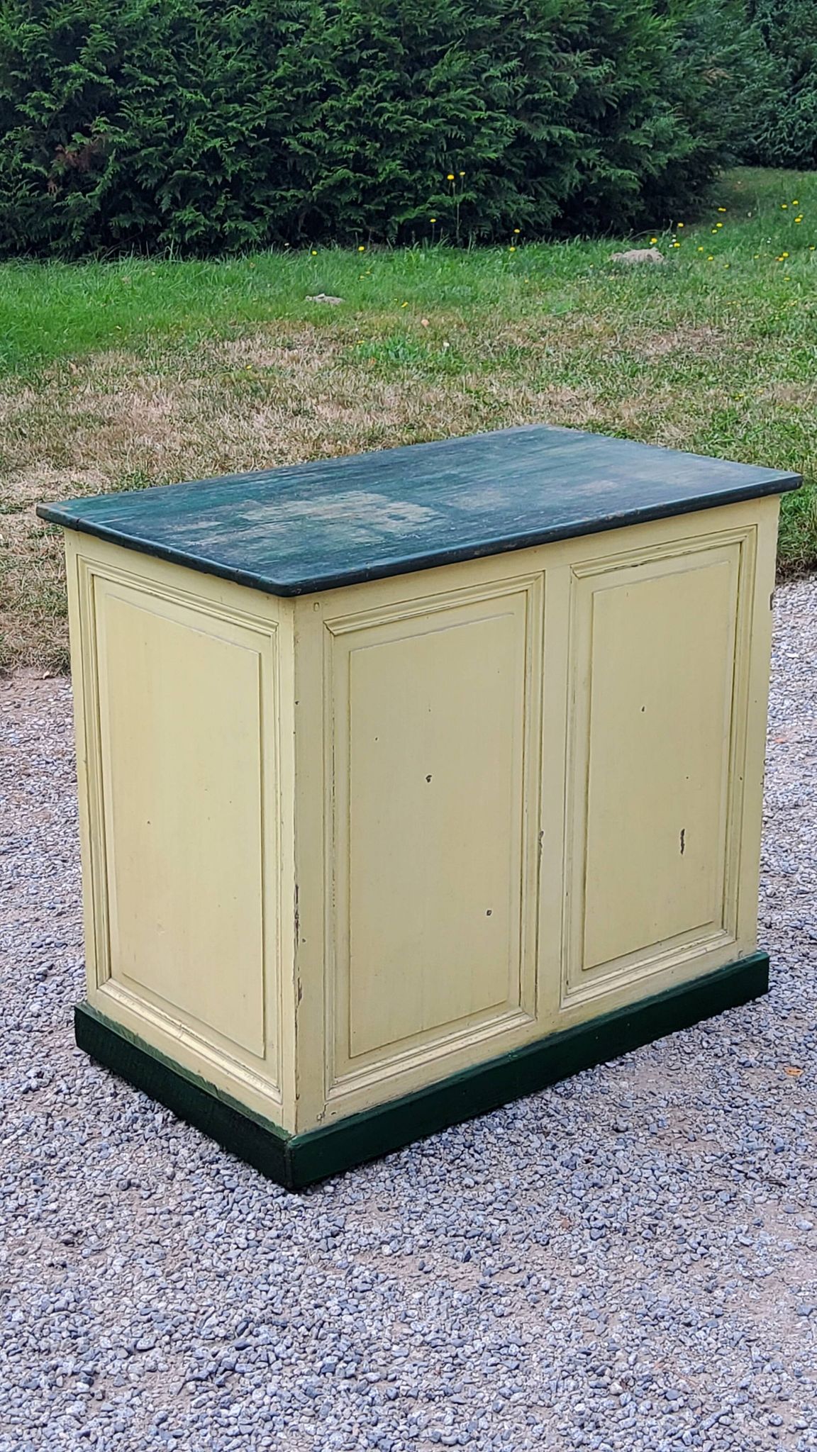 Late 19th century grocery counter in green and yellow patina painted wood