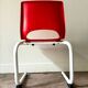 Children's chair in white metal and red plastic