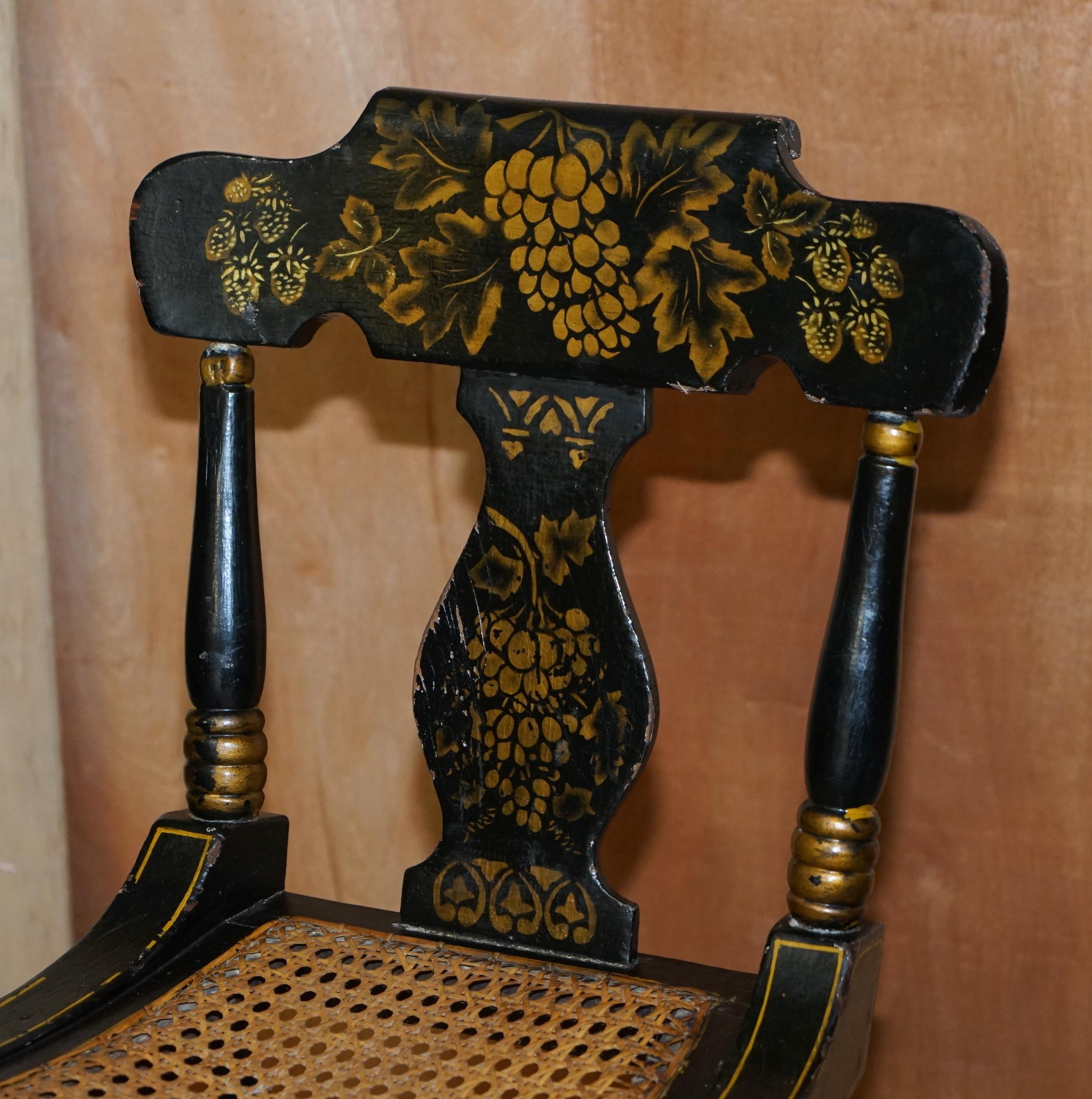 Georgian side bergère circa 1825, ebonised and hand-painted in Baltimore style.