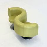Yellow green space age bench with wavy design