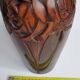 Decorative vase in turned and carved wood, signed "C. Léal", 30 cm