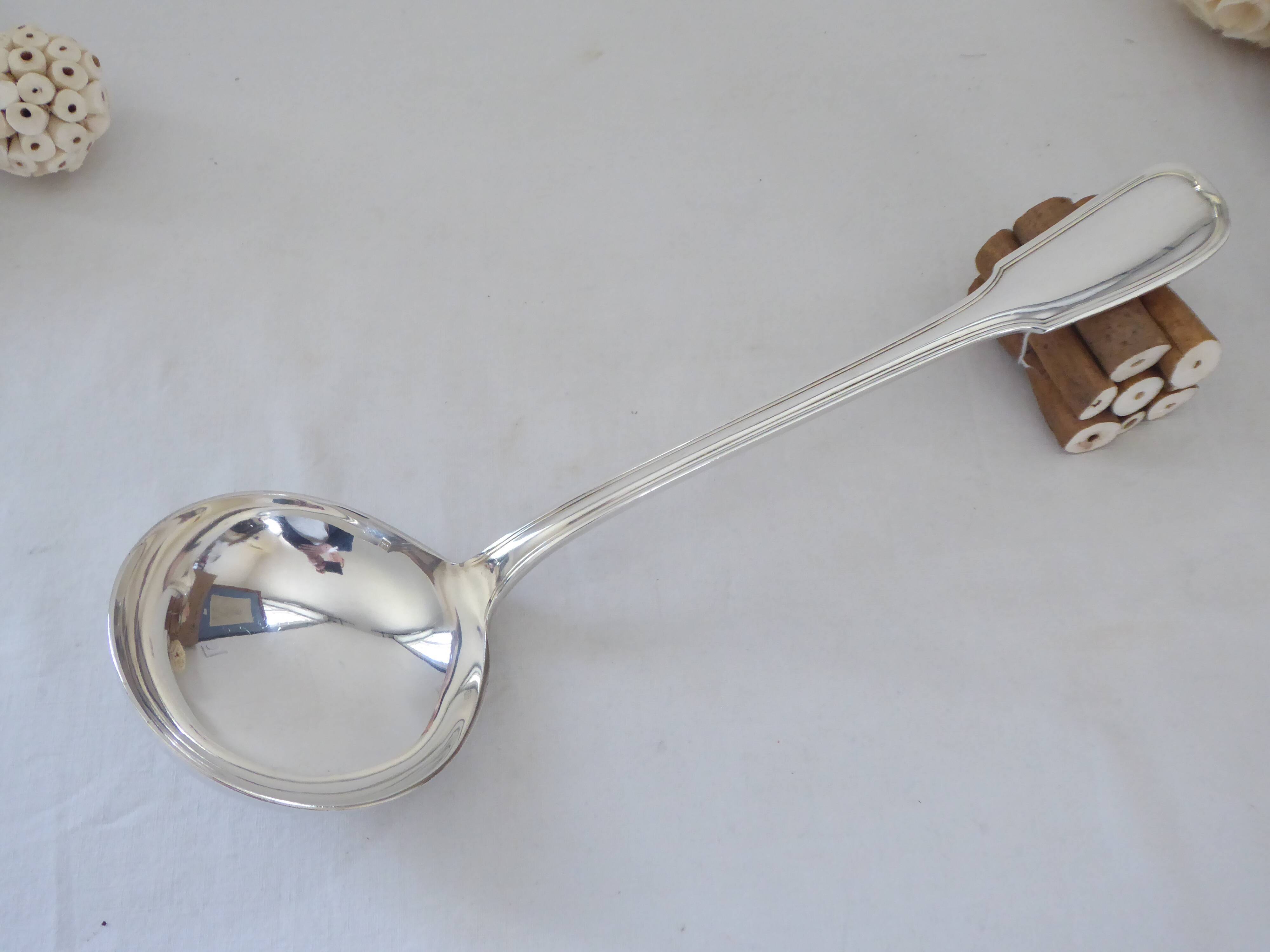 Silver metal ladle