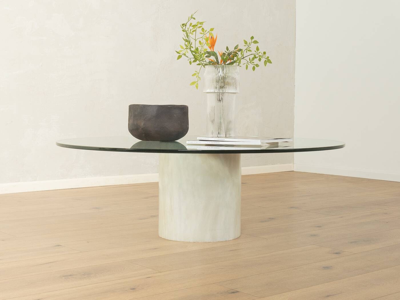 Postmodern coffee table from the 1980s with marble base and glass top