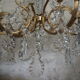 Chandelier 12 lamps with grapevines in crystal, bronze and regulated