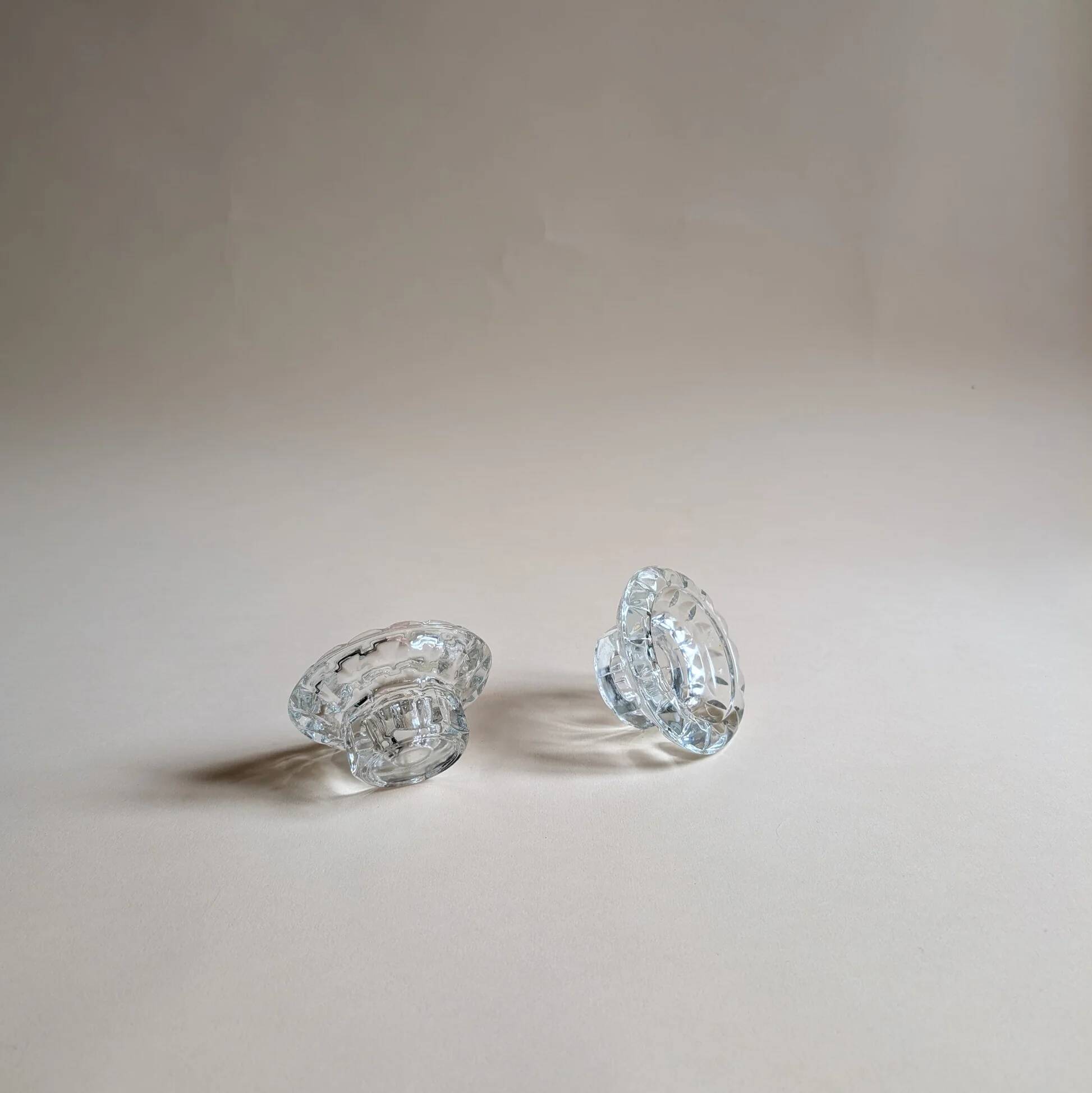 Pair of chiseled glass candlesticks, octagonal base