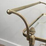 Neoclassical brass rolling table with double glass tops