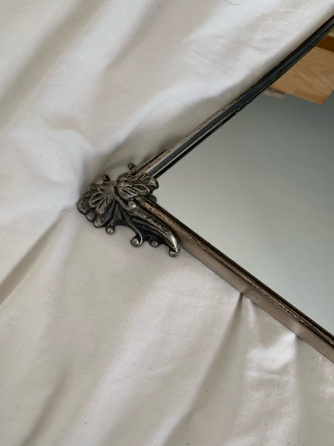 Silver metal mirror curved edge