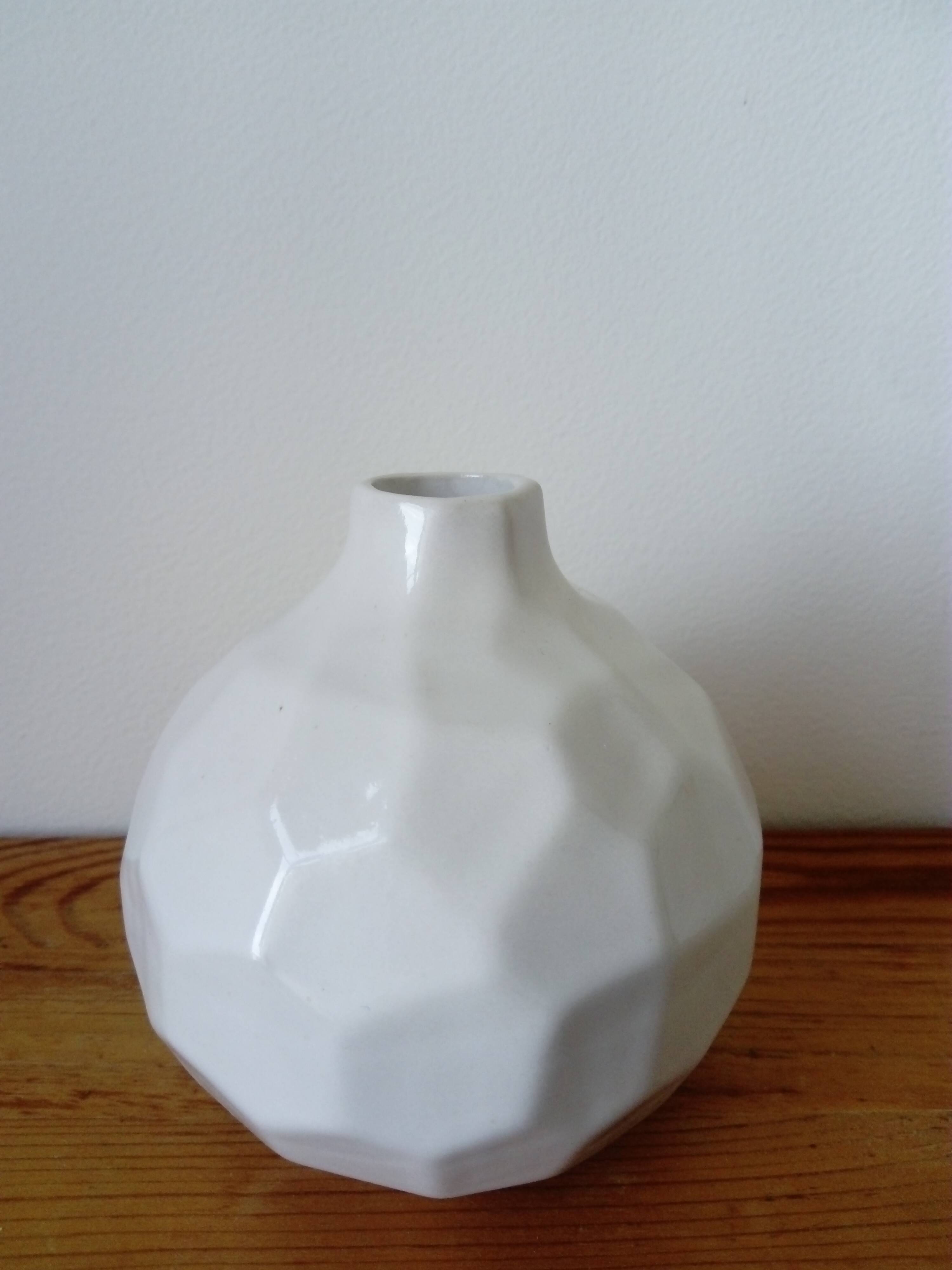 white ceramic faceted design vase