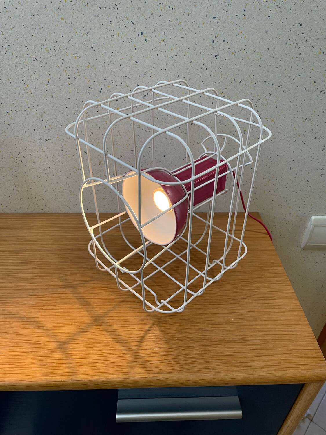 IKEA “cage” lamp designed by Matali Crasset