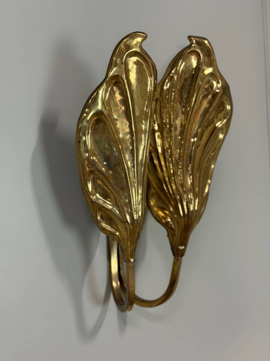 Set of four gilt brass wall lights, Tommaso Barbi, circa 1960.