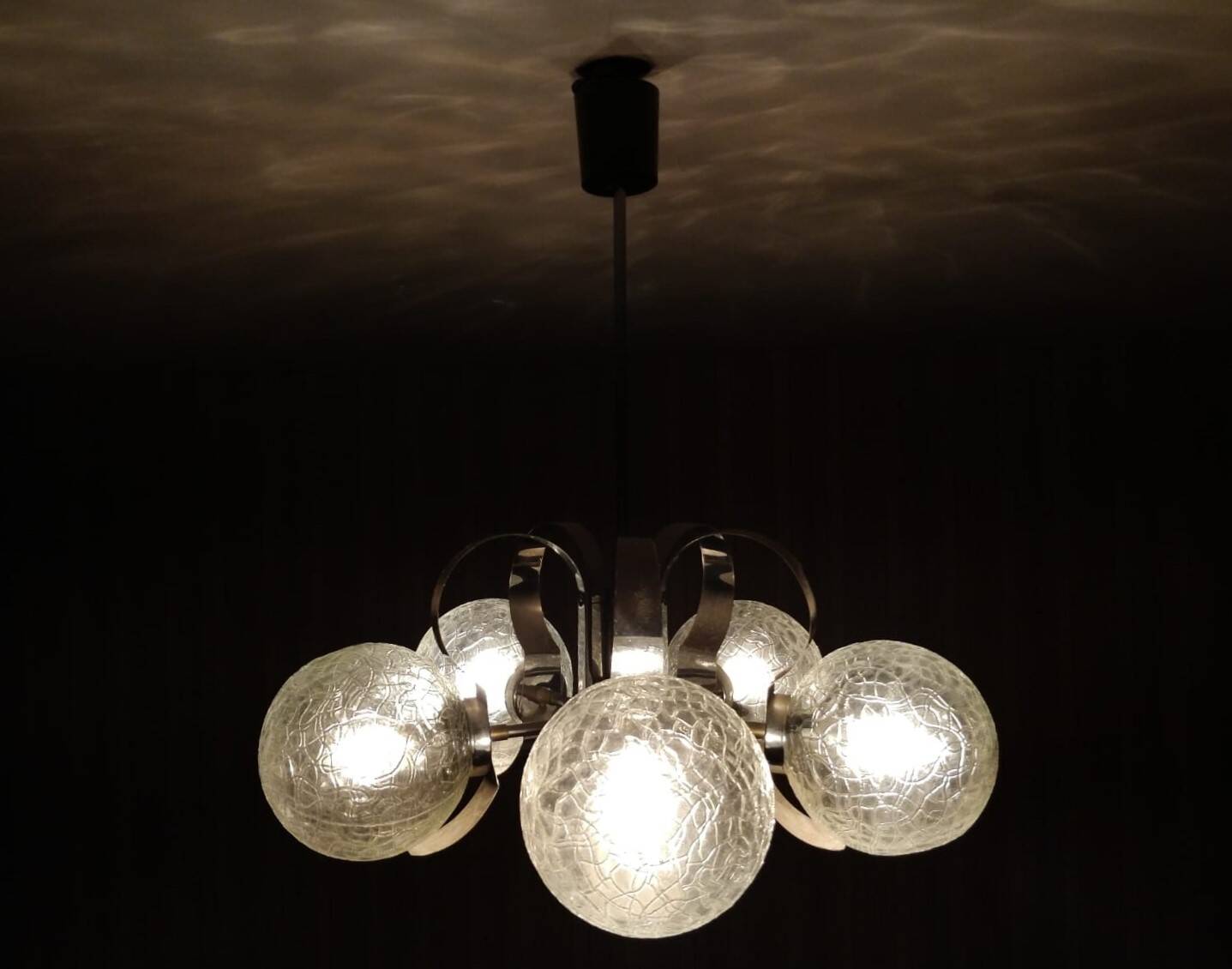 Vintage chandelier with glass globes and chrome steel
