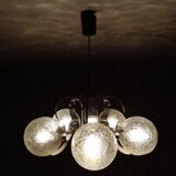 Vintage chandelier with glass globes and chrome steel