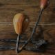 Double wrought iron coat rack with 3 double wooden ball hooks