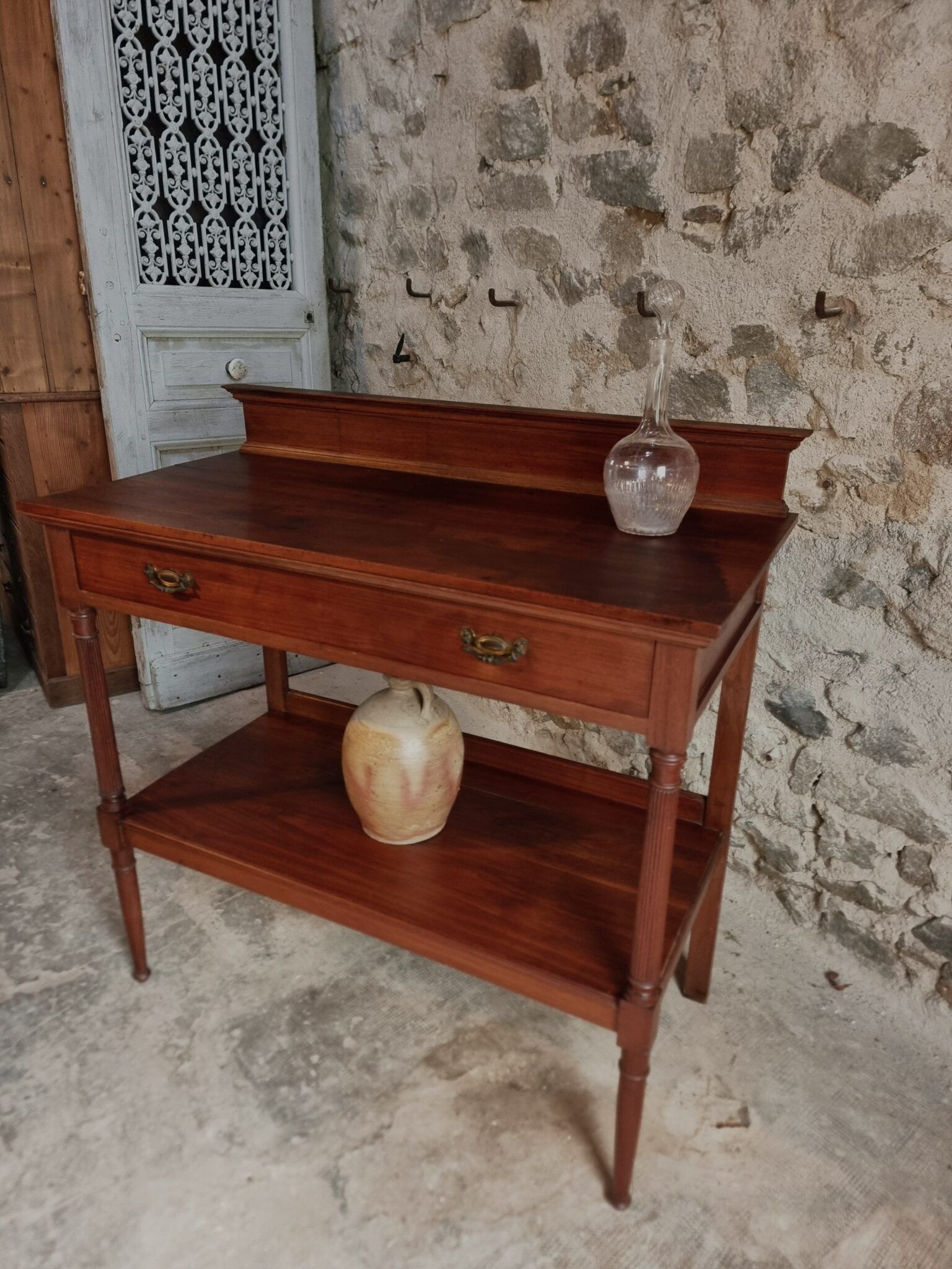 Antique mahogany console with drawer and shelf, French serving table, circa 1900.