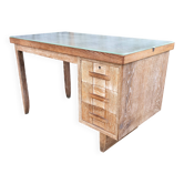 Vintage oak desk with three drawers and a cabinet.