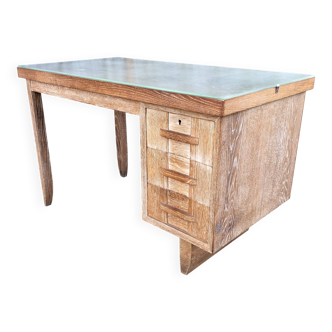 Vintage oak desk with three drawers and a cabinet.
