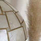 Table lamp with a lampshade with mother-of-pearl set with checkerboard brass and a gilded foot