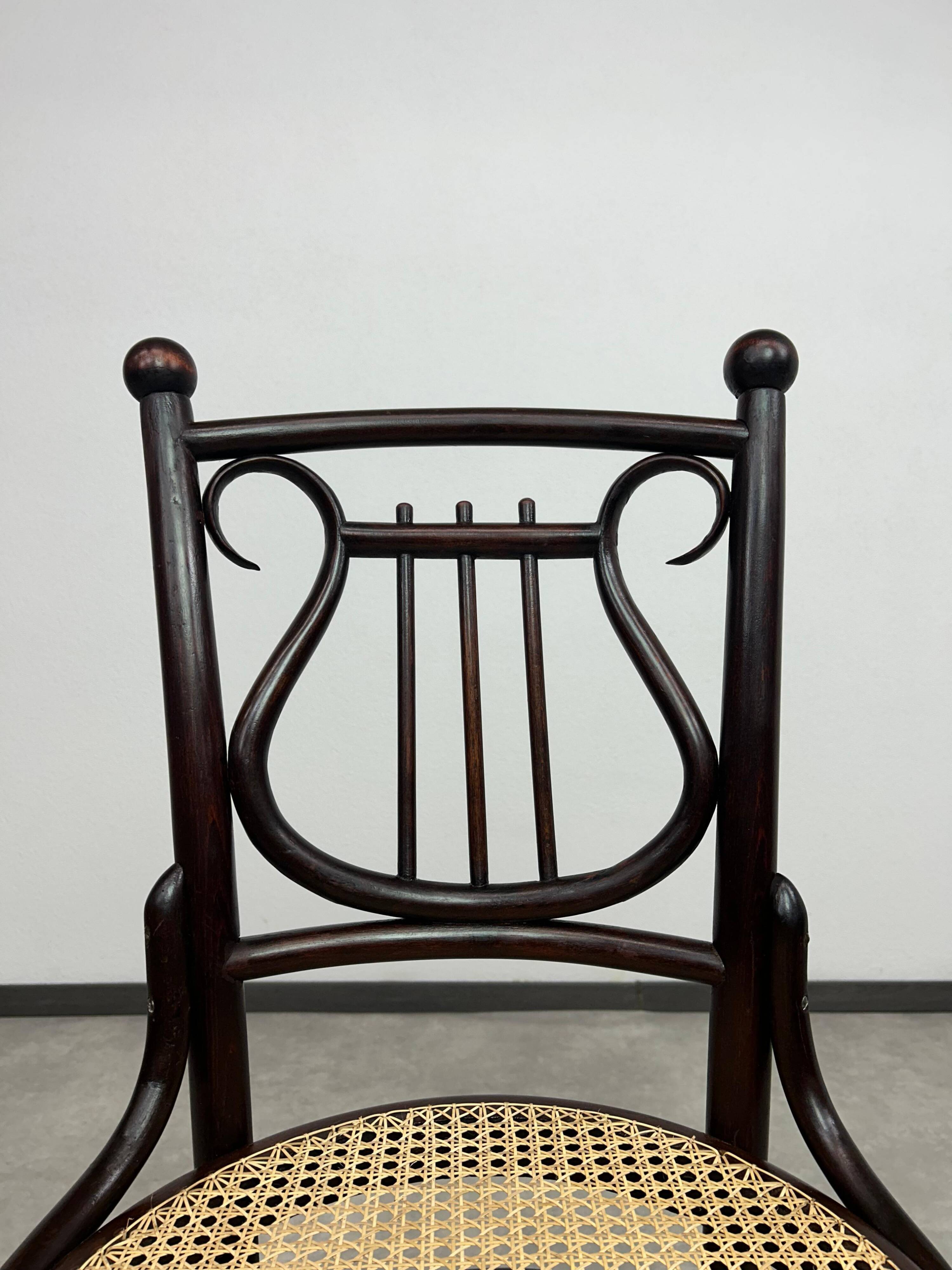 Curved wooden chair attributed to Thonet.