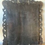 Eventful beveled mirror and openwork period 1900 repelled tin decoration