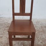 Old children's chair in solid teak