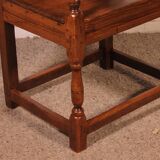 high-backed armchair from the 17th century in oak