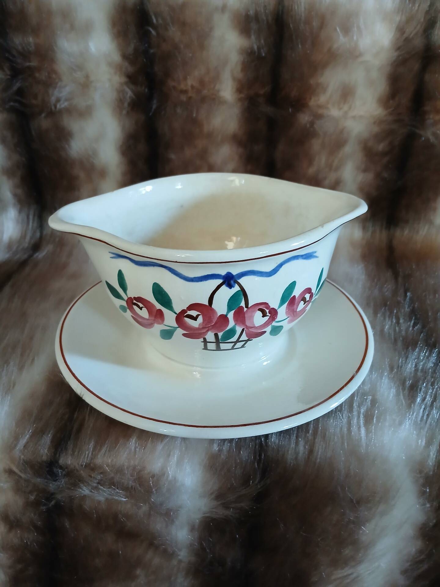 Antique sauce boat in Longchamp ironstone.