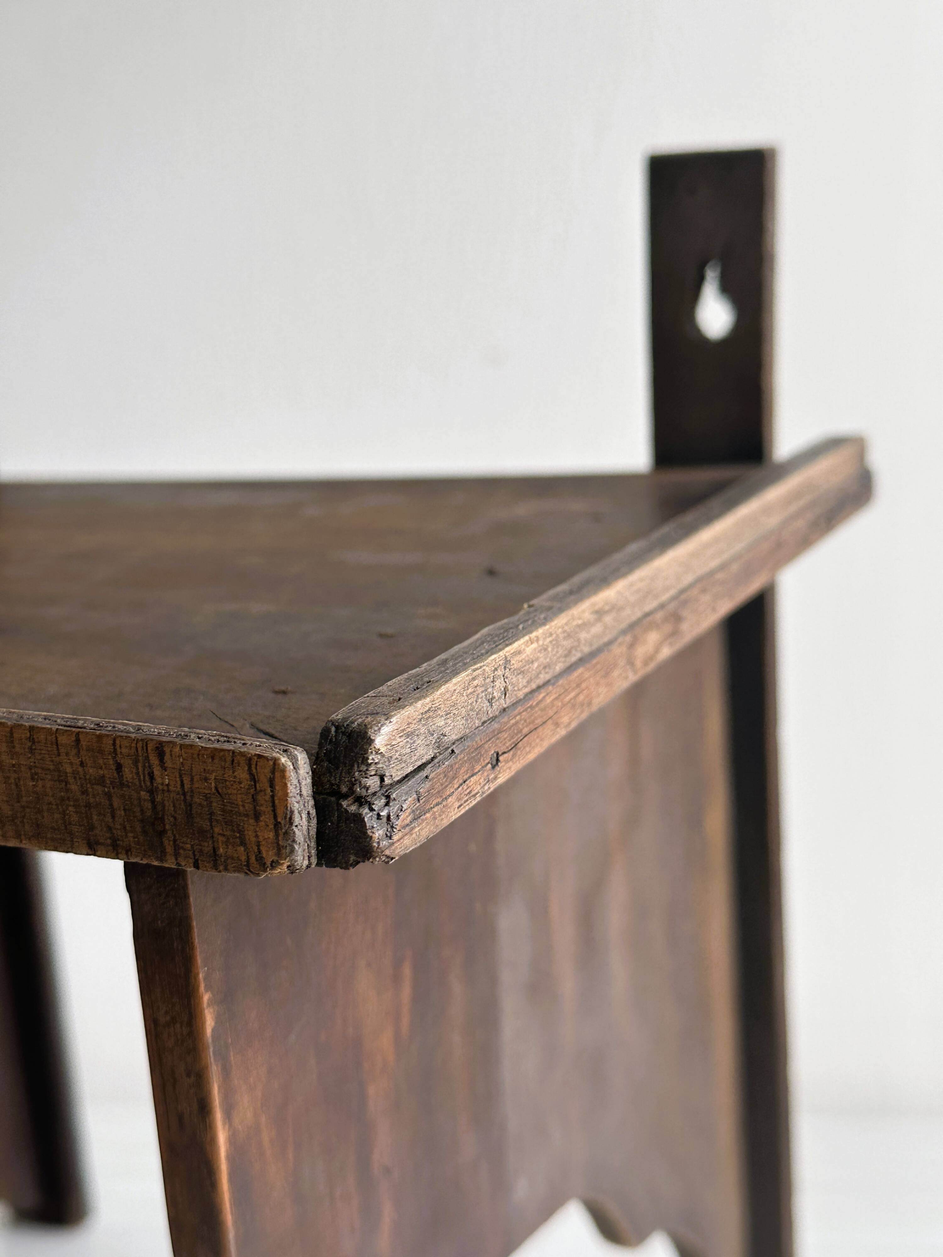 Antique wooden wall shelf.