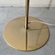 Cluster floor lamp with 3 spherical lamps in gold metal and white glass