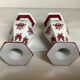 Pair of hexagonal burgundy candlesticks