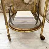 Cart serves brass bar