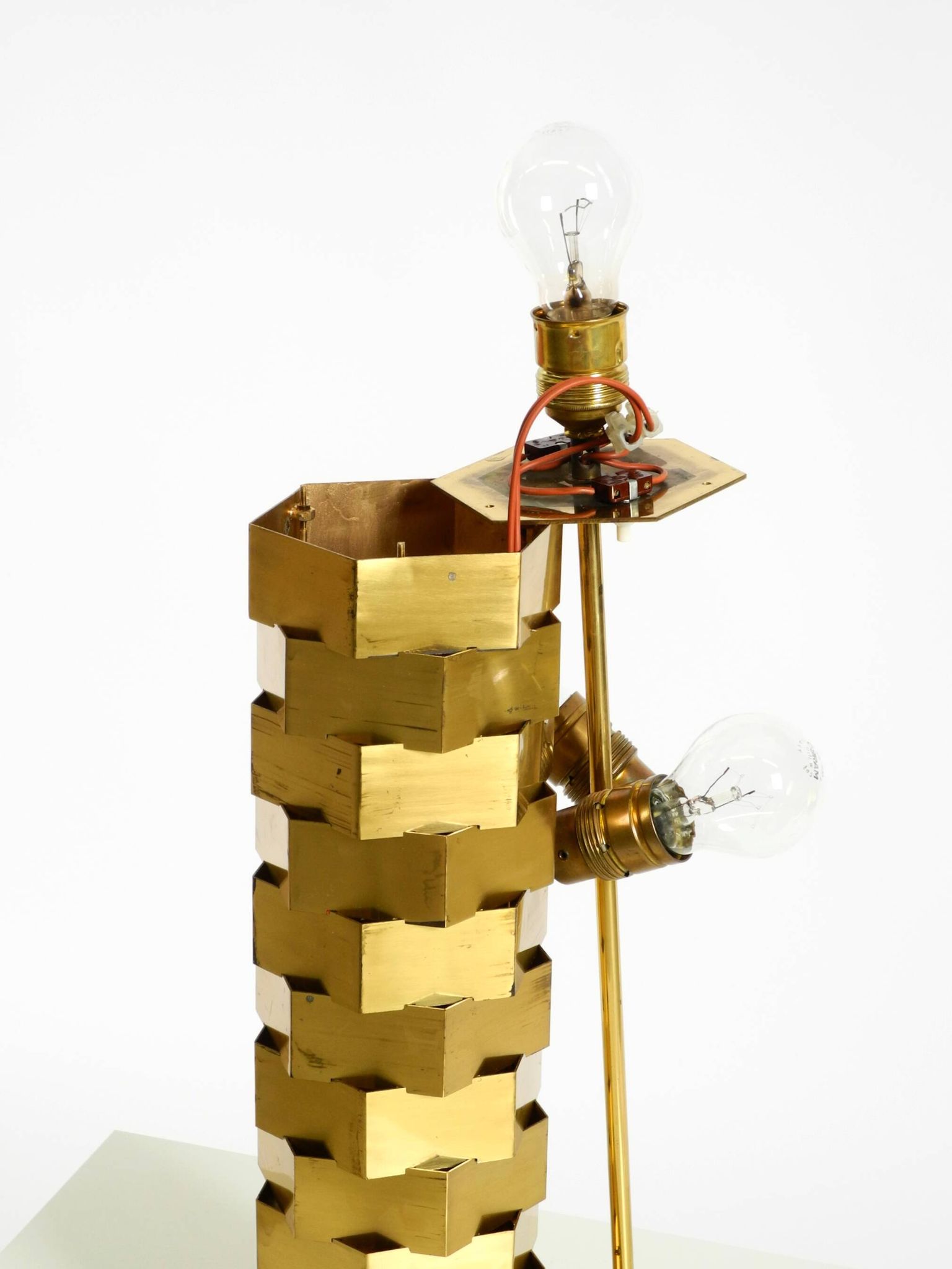1960s brass table lamp by Vereinigte Werkstätten with an illuminated base