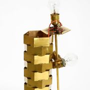 1960s brass table lamp by Vereinigte Werkstätten with an illuminated base