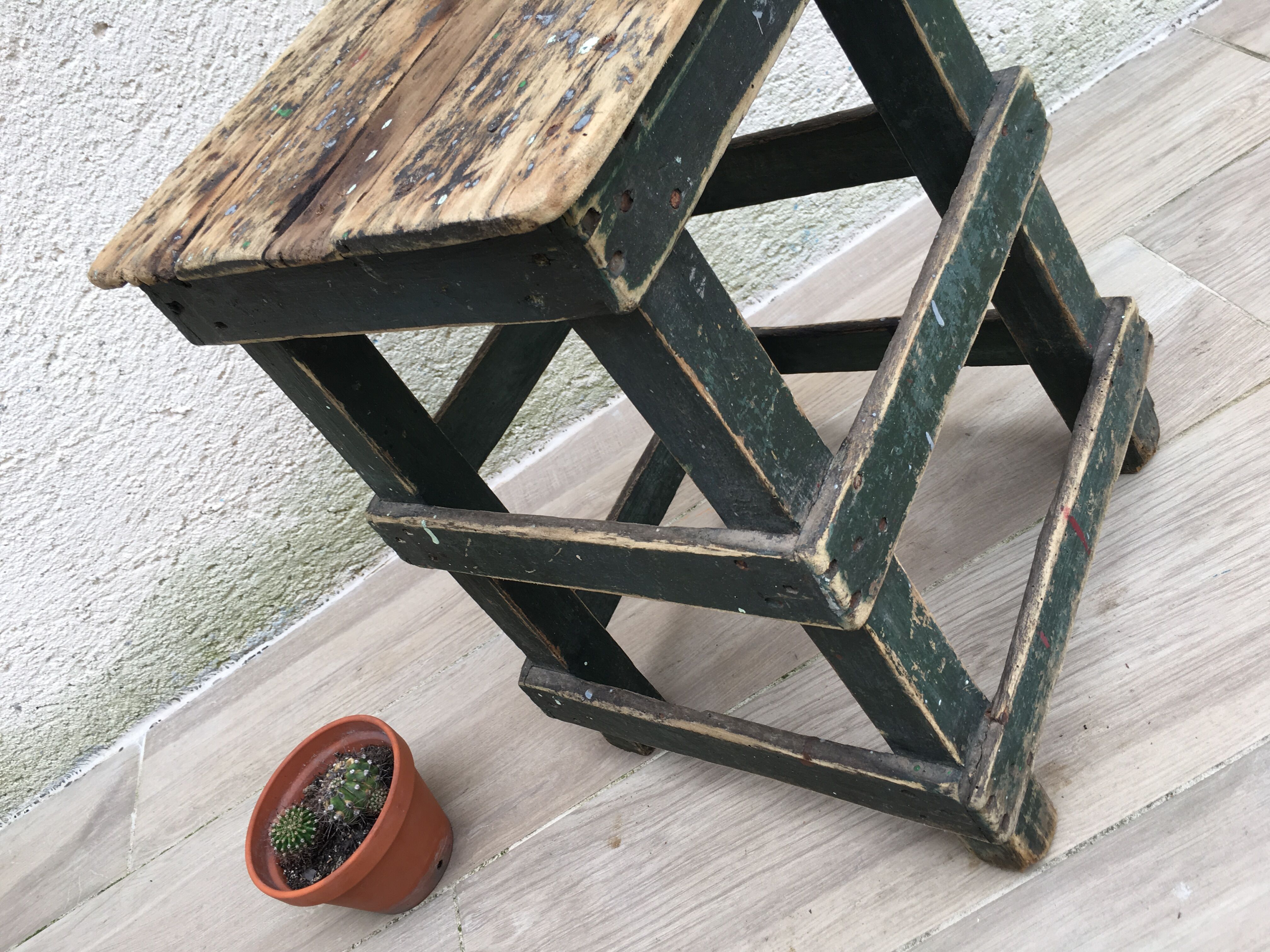 Former green workshop stool