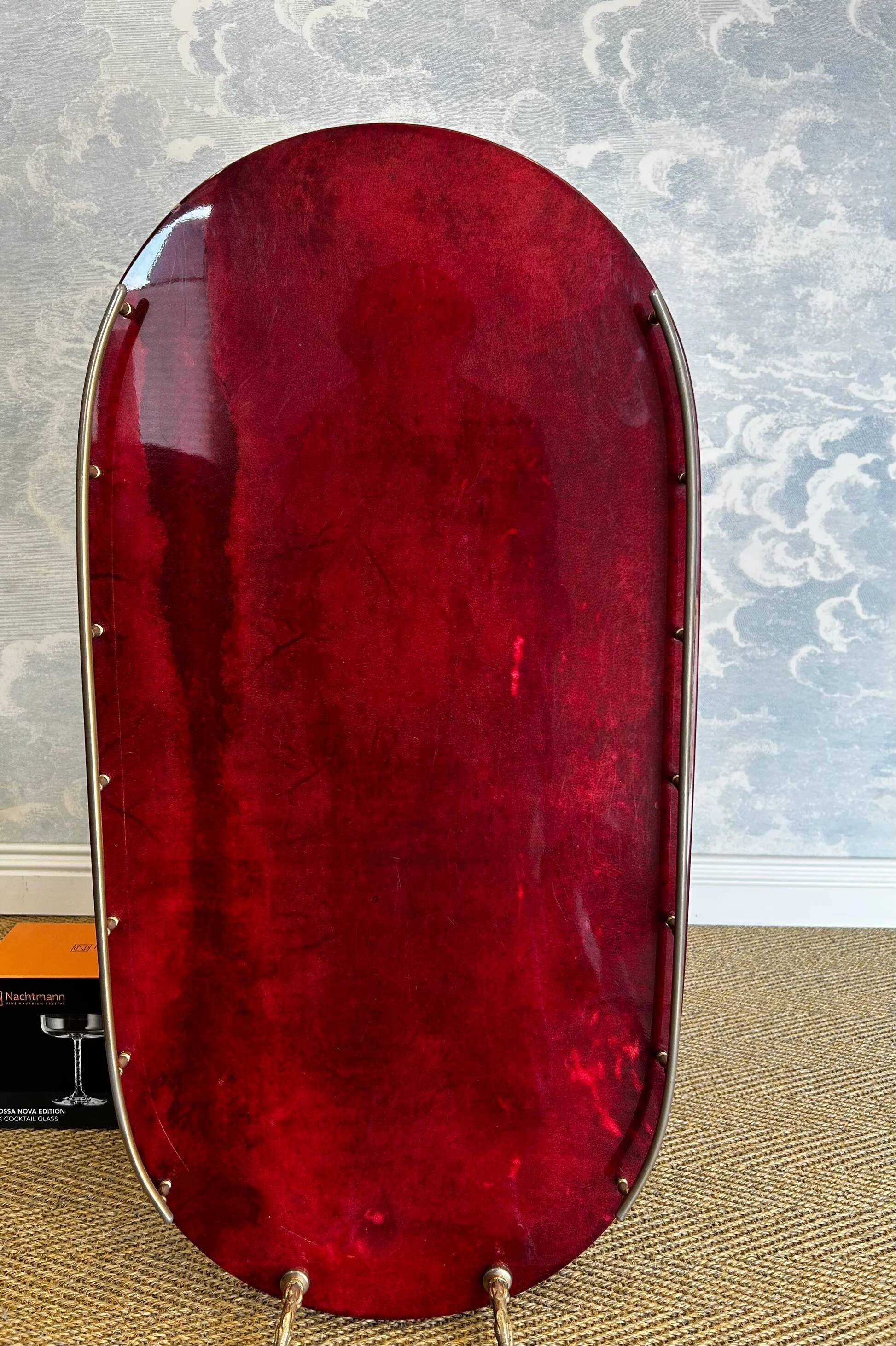 Cherry-red bar cart by Aldo Tura, Italy, 1960s, Hollywood Regency