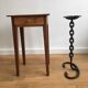 Wrought iron ashtray on its chain and anchor foot