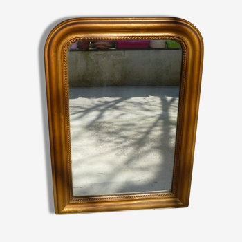 Miroir en peinture dorée