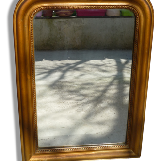 Miroir en peinture dorée