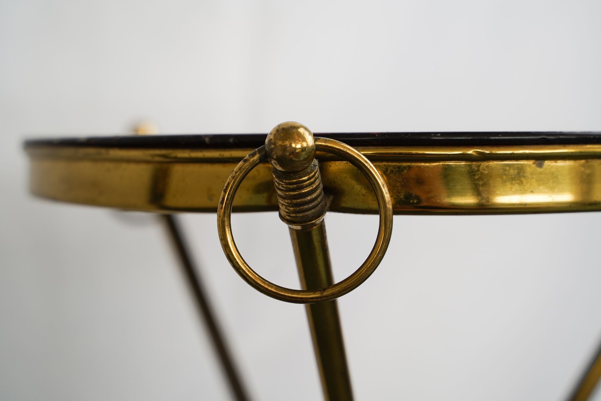 Small Italian brass and wood tripod coffee table from 50s