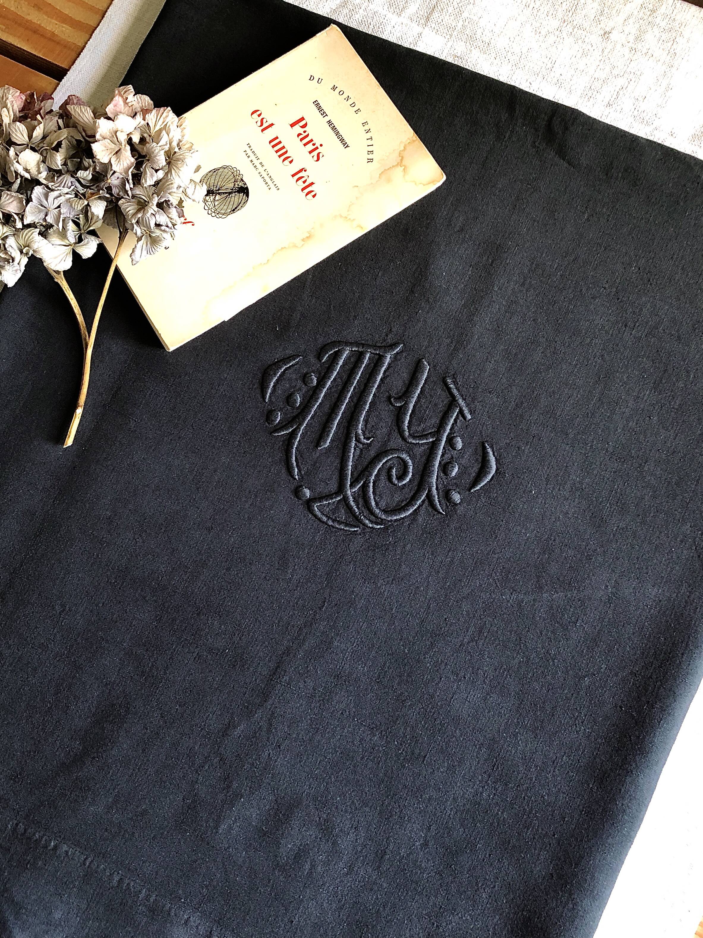 Old sheet in pure washed linen tinted in charcoal black