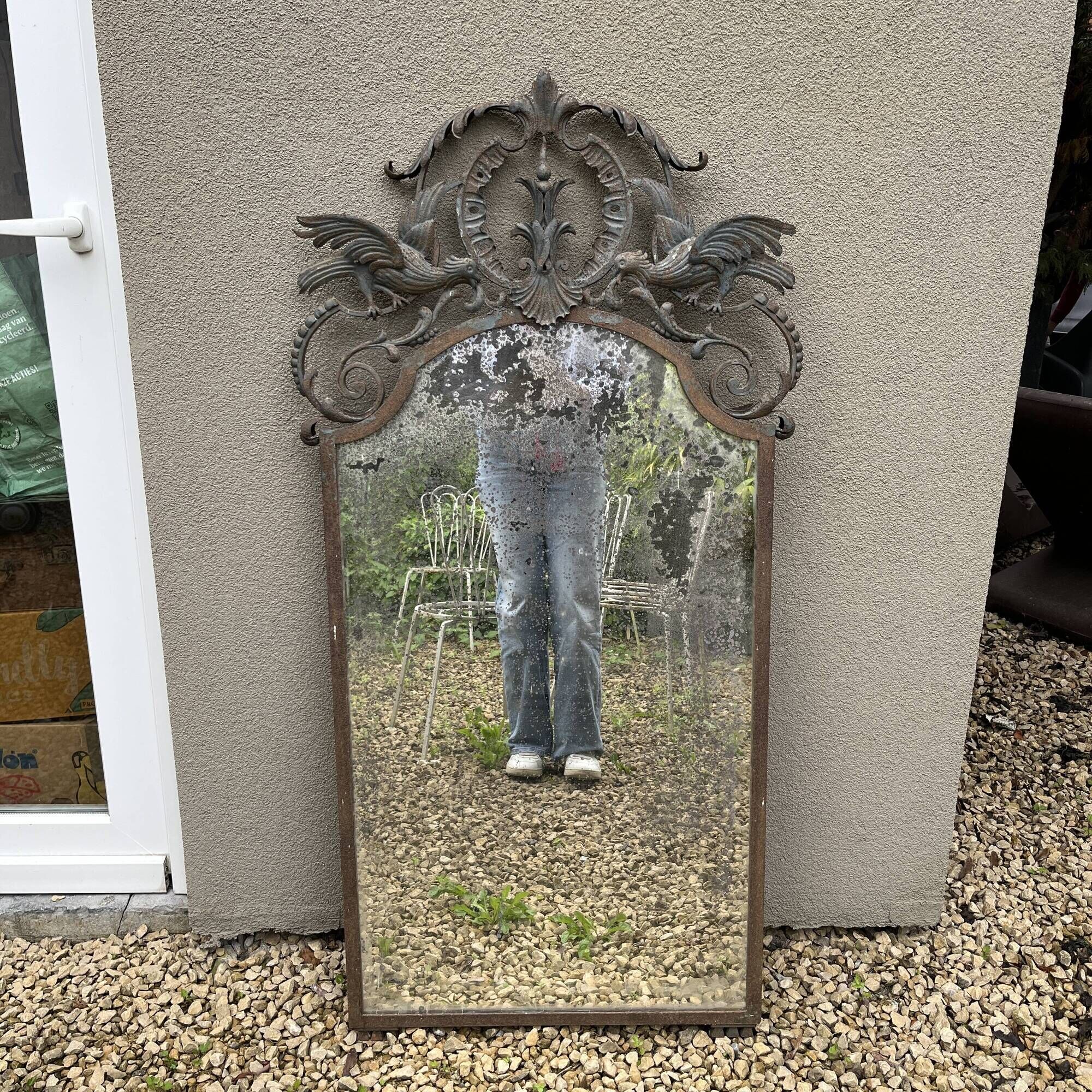 Art Deco wrought iron bird mirror in the style of Gilbert Poillerat, circa 1930