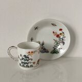 Limoges porcelain cup and sub-cup decorated in Chantilly in the Japanese Kakiemon style
