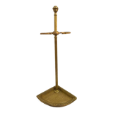 Old brass umbrella door triangular base mounted on column