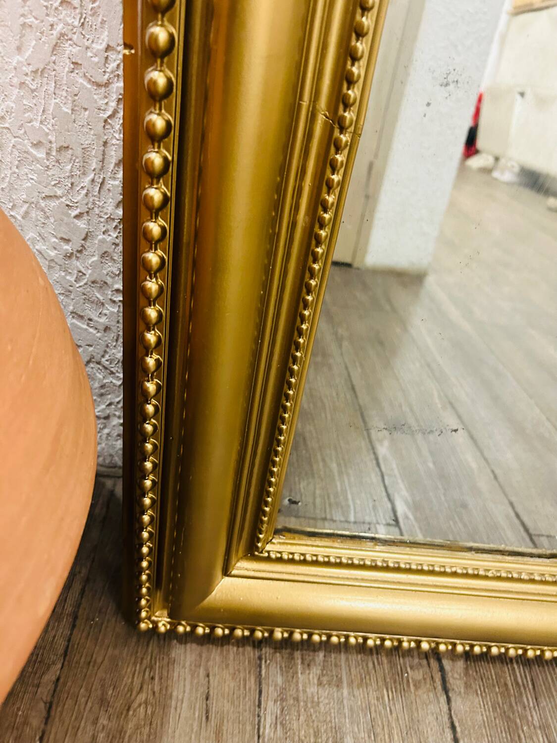 Antique gilded mirror in old Louis Philippe wood