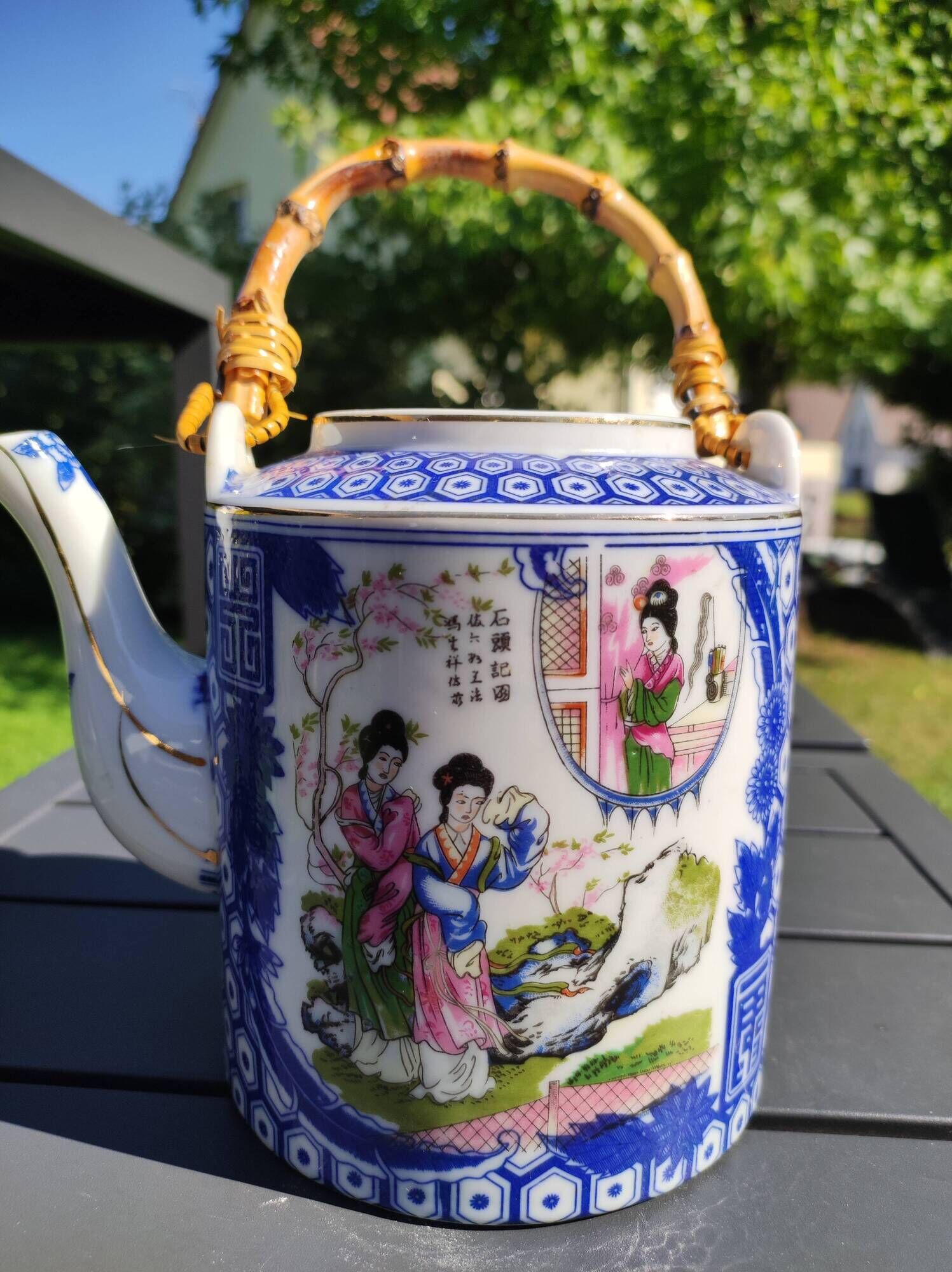 Asian, Japanese fine porcelain teapot with woven bamboo handle, vintage 50s