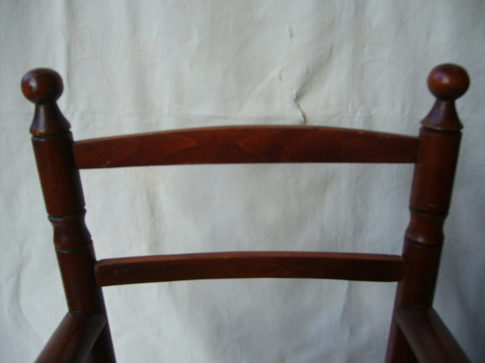 Wooden child's chair and mulched seat