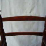 Wooden child's chair and mulched seat