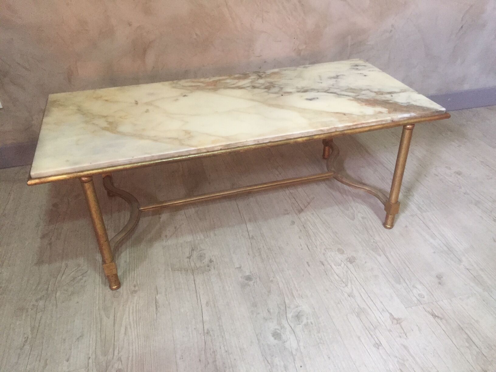 Marble and golden patina iron coffee table